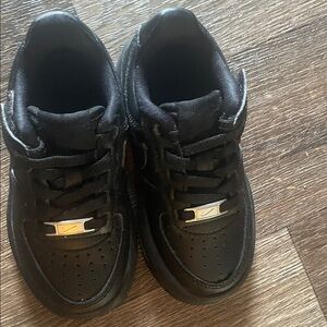 Nike Kids Black Sneakers with Silver Accents
